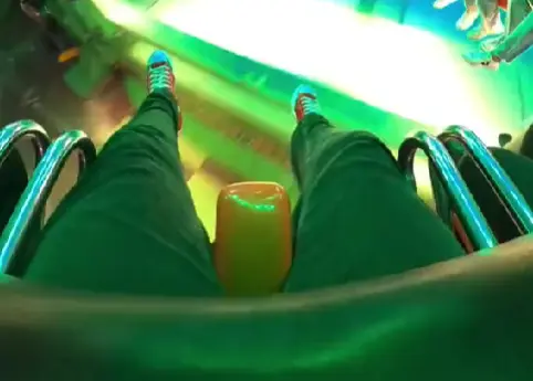 Young guy records himself going on a roller coaster using a GoPro strapped to his chest